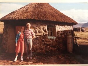 Marie & Kirk in front of Rondavel Peace Corps Home in Lesotho 1981-1983