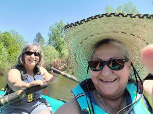 Catherine and Christina Rowing a Boat