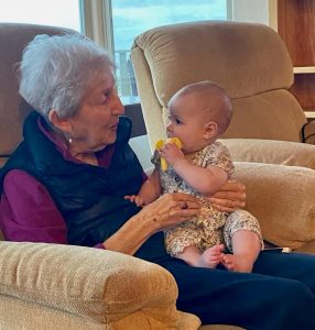 With great-granddaughter, Evelyn Anne
