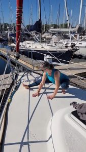 Allison Stretching on Sailboat