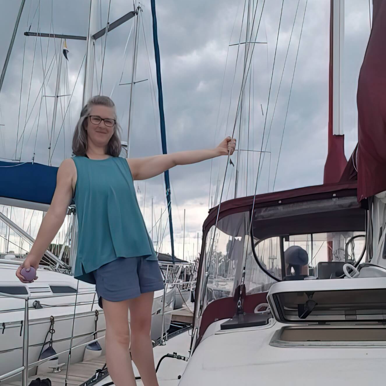 Allison Standing on Sailboat