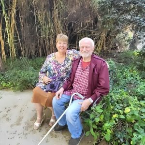 Ruth and Stjepan sitting in garden 2021 