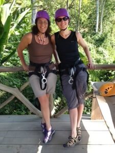 Caron with friend Gwen in hard hats for athletic adventure in Costa Rica 2015