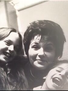 Caron as a child with older sister Ellen and mother, Lydia 