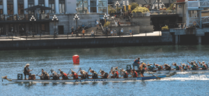 Golden Dragon Boat finishing first in race in Victoria harbor