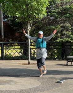 Sylvia doing exercises before Dragon Boat paddling