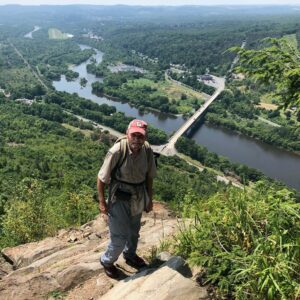 Ron climbing mountain overlooking Lehigh River near Andreas, PA - July 16, 2018