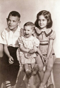 Jill as a young child with sister and brother